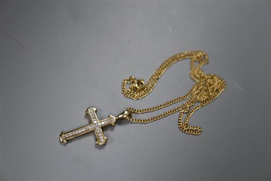 A 9k and diamond set gold cross pendant, on a 375 chain, pendant overall 31mm, gross 5.2 grams.